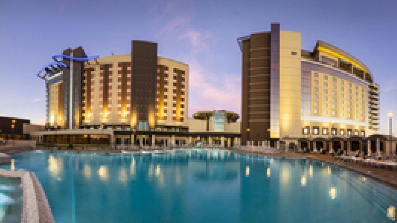 Wild Horse Pass hotel towers and pool at dusk, Chandler, Arizona